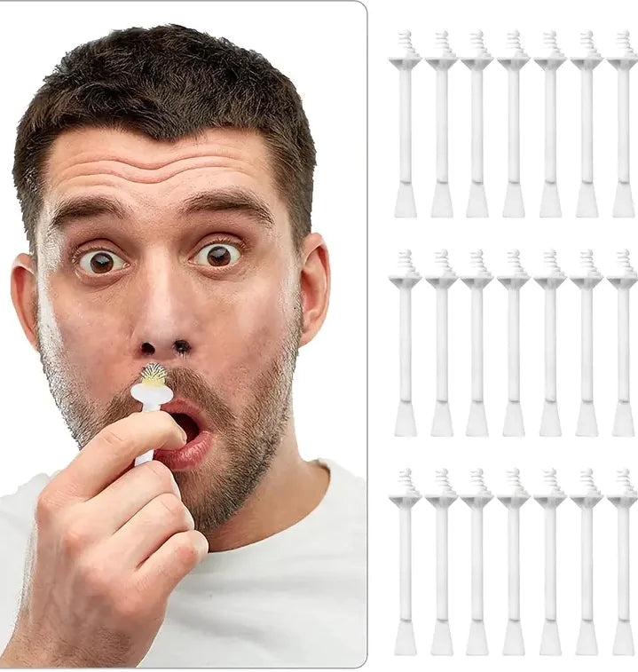 Man holding a white electric toothbrush head with multiple toothbrush heads displayed on a white background.