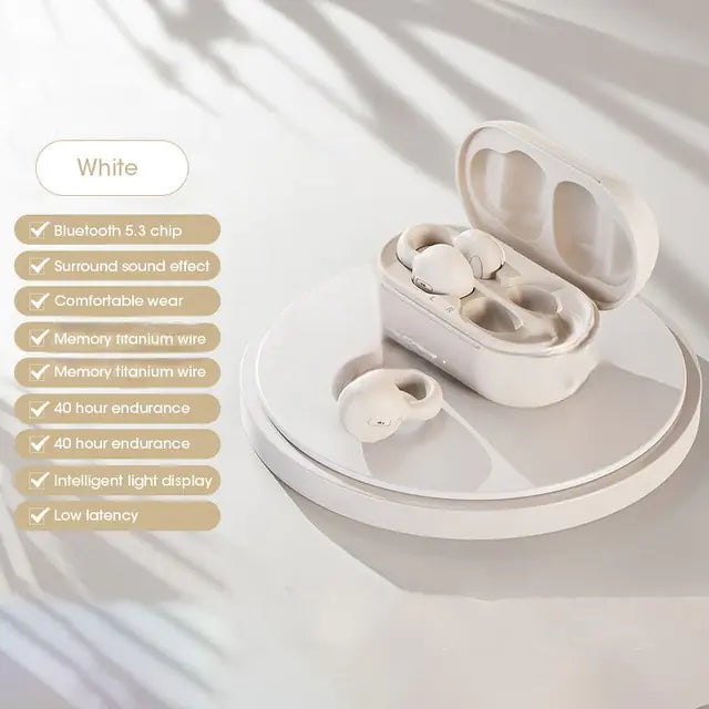 White wireless earbuds with their charging case, displayed on a circular white surface. The earbuds feature Bluetooth 5.3, surround sound, comfortable wear, memory titanium wire, 40-hour battery life, and low latency. The case is slightly open, revealing the earbuds inside.