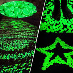 Glow-in-the-dark green pebbles shown in use: a pile of luminous stones, a pathway sprinkled with glowing pebbles, feet standing on the lit stones, and the pebbles arranged into a star shape on a dark surface.