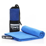 Blue microfiber towel folded and partially rolled beside a matching blue towel in a black-and-blue mesh drawstring pouch labeled “MICROFIBER TOWEL” on a white background.