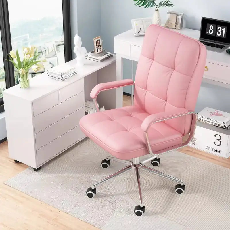 Pink office chair in a modern office setting with a desk and decor.