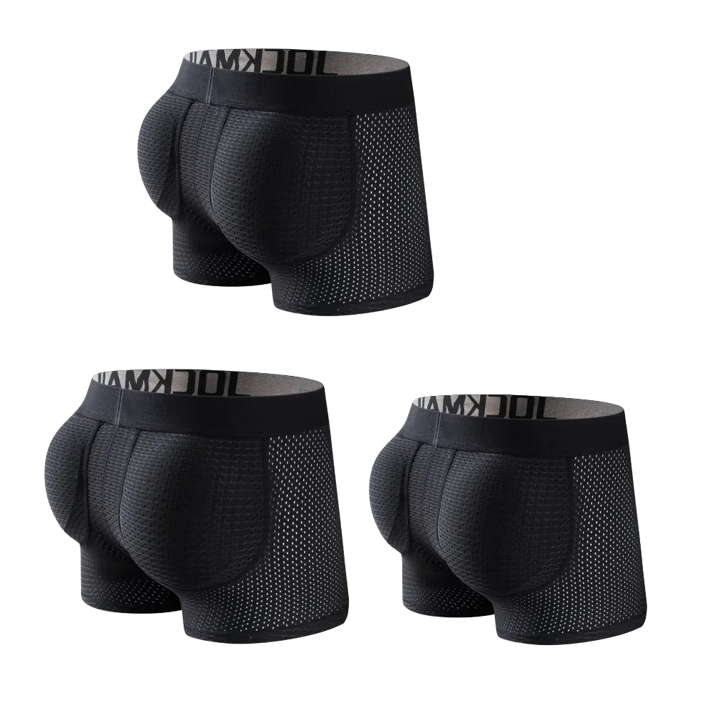 Black padded compression boxer shorts with breathable panels.
