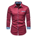 Men’s red long-sleeve shirt with blue check trim.
