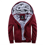 A stylish two-tone hoodie with a navy blue body and red sleeves, featuring a thick, plush gray fleece lining for warmth. The hood is large and lined with the same soft material, and the jacket includes a full-length zipper and two front pockets with red accents. Designed for cold weather comfort.