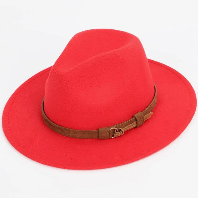 Bright red wide-brim fedora hat with a brown buckle band.