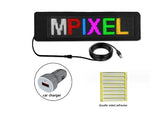 LED pixel display panel showing the word “MPIXEL” in multicolored lights, with a USB cable, a car charger adapter, and double-sided adhesive strips.