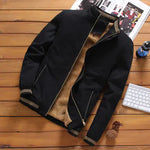 Black fleece-lined zip-up jacket.
