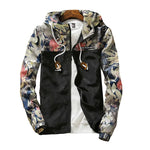 Black zip-up hooded jacket with floral print sleeves and drawstrings.