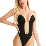 Model wearing a black lace one-piece bodysuit with a deep plunging front cutout and high-cut legs, shown on a white background.
