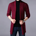Men’s burgundy open-front cardigan worn over a black turtleneck.
