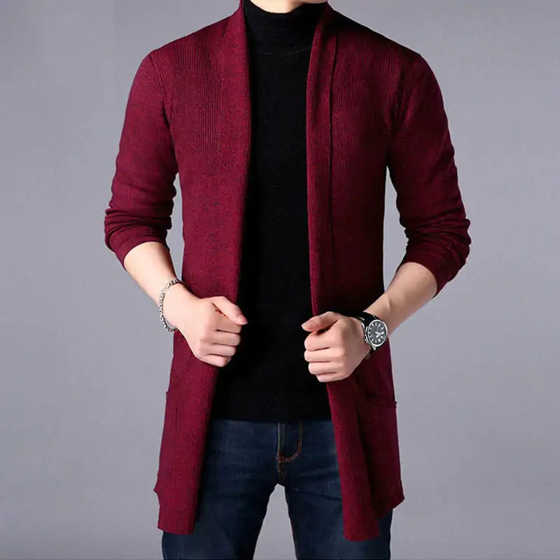 Men’s burgundy open-front cardigan worn over a black turtleneck.
