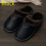A pair of cozy brown indoor slippers with dark brown faux fur lining, displayed on a dark wooden floor. The slippers are labeled "Coffee color" in yellow text.