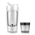 A white portable blender with a measuring scale and a separate container for blending or mixing, featuring a small stirrer inside.