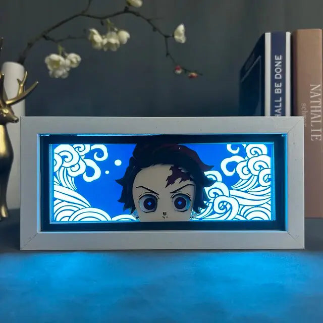 Demon Slayer characters in a light-up display box