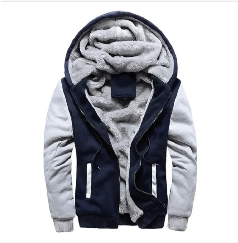 A stylish two-tone hoodie with a navy blue body and red sleeves, featuring a thick, plush gray fleece lining for warmth. The hood is large and lined with the same soft material, and the jacket includes a full-length zipper and two front pockets with red accents. Designed for cold weather comfort.