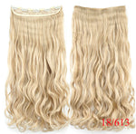 Two long, wavy clip-in hair extension pieces in a light “natural blonde” shade on a white background, shown front and back with the text “Natural Blonde” underneath.