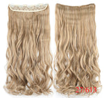 Two long wavy “halo” hair extension pieces in jet black, shown front and back with a clear wire and clip attachments, on a white background labeled “Jet Black