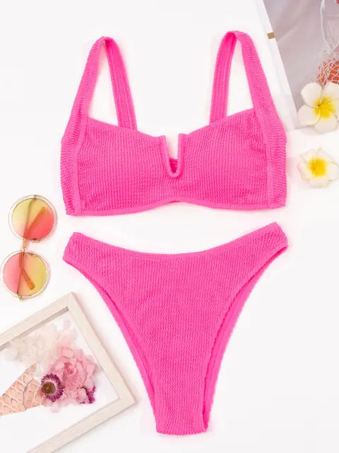 Pink textured two-piece bikini set.