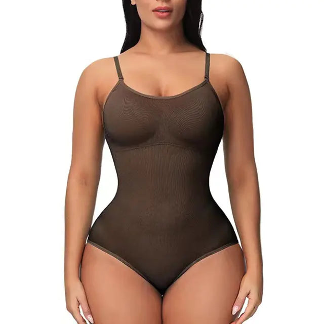 Woman modeling a brown seamless shapewear bodysuit with spaghetti straps and brief-cut bottom, shown on a white background.
