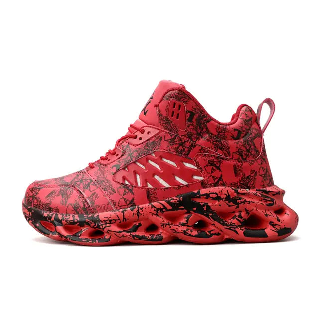 A high-top athletic sneaker featuring a bold black and white graffiti-style pattern, with a thick, sculpted sole and black mesh detailing on the side, displayed on a white background.