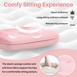 Pink cushion with text highlighting its features on a white background