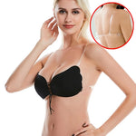 Woman modeling a black lace-up push-up bra with transparent shoulder straps and a clear back strap, with an inset image showing the back view.