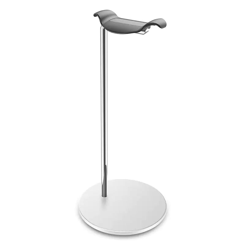 Minimalist metal stand with a circular base and a tall chrome pole topped by a small curved black cradle, shown on a white background.