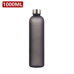 A tall, matte dark-gray/black water bottle with a silver screw cap, labeled “1000ML” in the top-left corner on a white background.