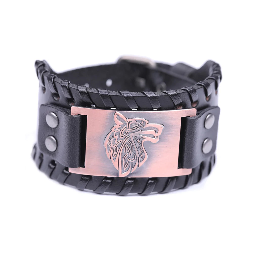 Black braided leather cuff bracelet with snap closure and a rose-gold-toned rectangular plate engraved with a wolf head design, shown on a white background.
