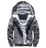 A stylish two-tone hoodie with a navy blue body and red sleeves, featuring a thick, plush gray fleece lining for warmth. The hood is large and lined with the same soft material, and the jacket includes a full-length zipper and two front pockets with red accents. Designed for cold weather comfort.