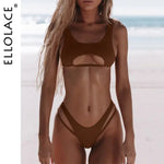 A model wearing a brown two-piece bikini with a scoop-neck top featuring a front cutout and high-cut bottoms with double side straps, standing on a beach; “ELLOLACE” branding runs vertically along the left side.