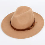 Beige wide-brim fedora hat with a brown buckle band.