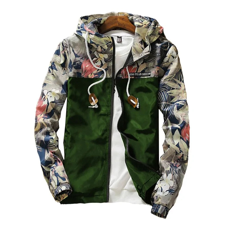 Green hooded zip-up jacket with floral print sleeves, drawstring hood and toggle details.
