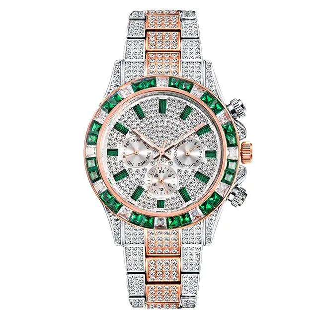 A luxury-style two-tone metal wristwatch covered in rhinestones, featuring a rose-gold bezel set with green and clear stones, green hour markers, three subdials, and a matching diamond-like bracelet band on a white background.