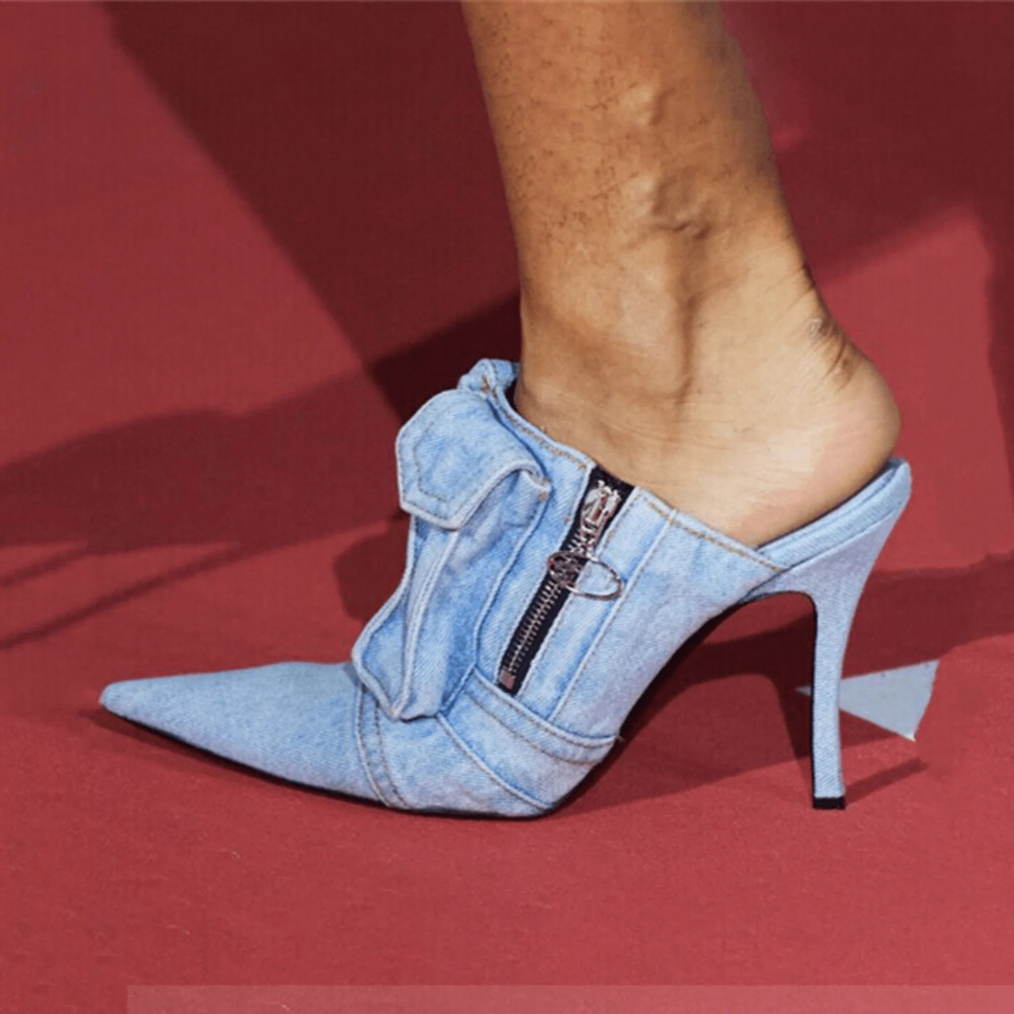 Heeled mules in washed denim