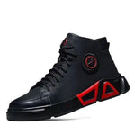 A rugged dark gray high-top sneaker boot with thick treaded sole, lace-up front, mesh and synthetic panels, and white printed text details on the side and tongue, displayed against a plain white background.