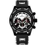 A studio product image of a bold black men’s wristwatch on a white background, featuring a large round case with a cable/wire-style bezel detail, a multi-dial chronograph face with white and black segments and orange accent hands, and a black silicone strap with metal hardware.