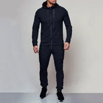 Men’s black hooded tracksuit with ribbed detail.
