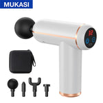 White and rose-gold MUKASI handheld massage gun with a black foam ball head attached, digital display showing “32,” and four interchangeable massage heads plus a black carrying case.