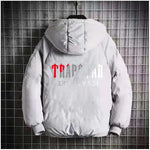 Light grey hooded puffer jacket with a padded design, elastic cuffs, and bold back graphic lettering.
