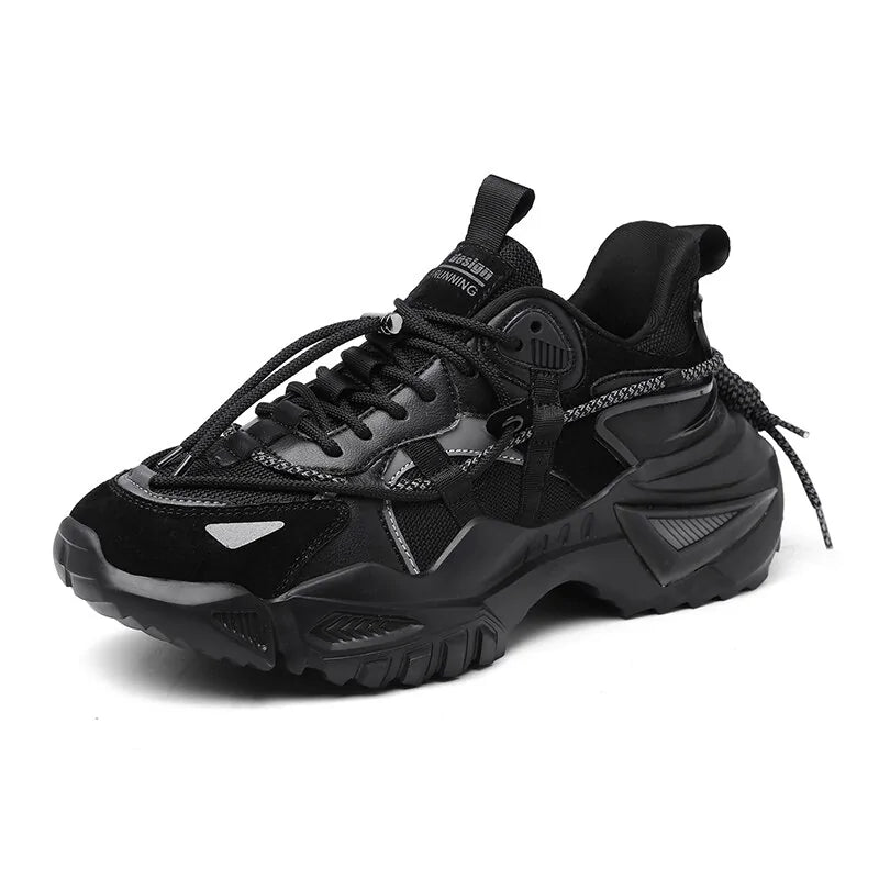Black chunky lace-up trainers.