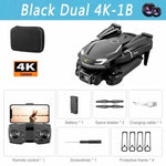 A product collage for a black foldable drone labeled “Black Dual 4K-1B,” showing the drone, a carrying case, remote control with phone mount, one battery, two spare blades, a charging cable, a screwdriver, and four protective frames. The image also includes “4K Camera” text and small camera lens graphics at the top.