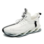 White knit athletic sneaker with white laces, black accent stripes on the toe and heel, and a sculpted chunky sole with hollow cutouts, shown on a white background.