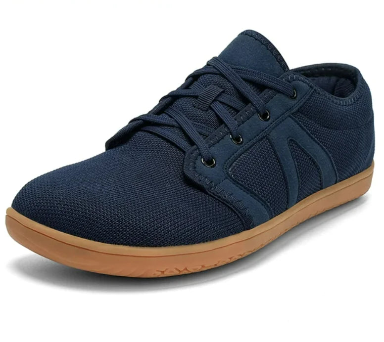 "Maroon-colored casual sneaker with a mesh fabric upper, lace-up design, black eyelets, and a white rubber sole.