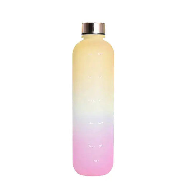 Frosted gradient water bottle fading from pale yellow to pink with a silver screw-on lid and faint time markers on the front, on a white background.