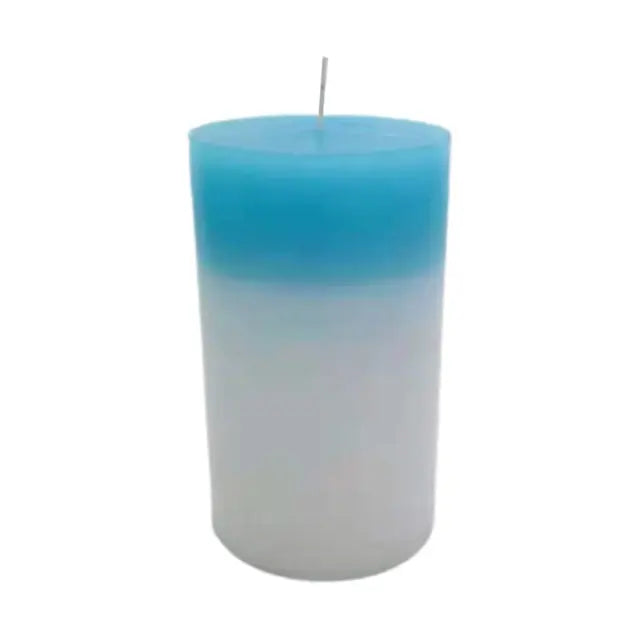Blue-to-white gradient pillar candle with a centered wick, photographed on a white background.