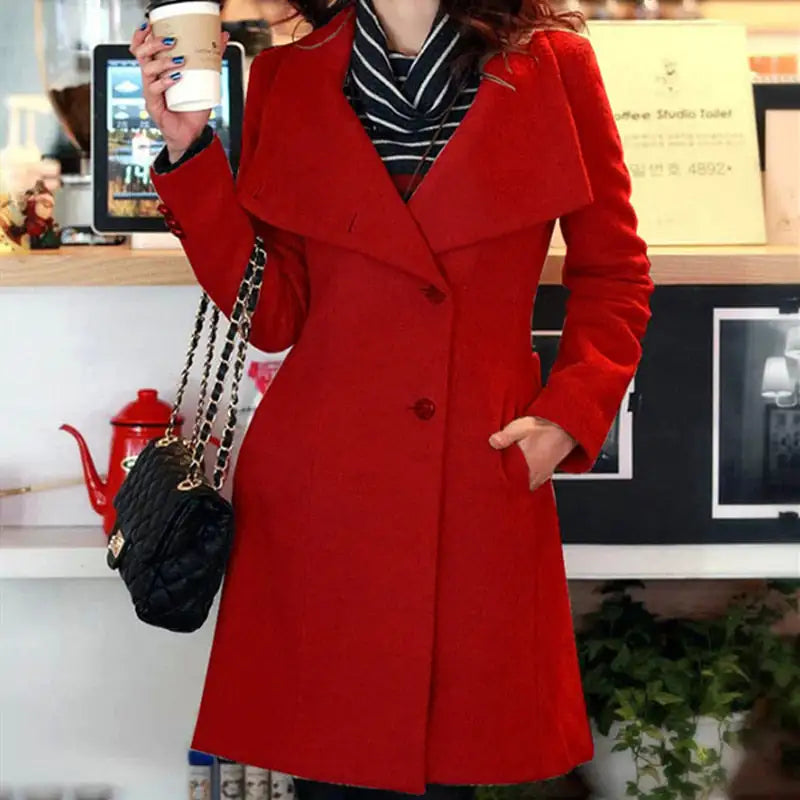 Woman wearing a stylish deep red long-sleeve mini dress with a sweetheart neckline, layered ruffle skirt, and puffed sleeves, posing with one hand on her waist