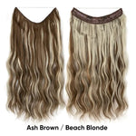A studio product image of two long, wavy flip-in/halo hair extensions on a white background, shown in different shades—medium auburn and ash blonde—with a thin wire/halo band along the top. Text at the bottom reads “Medium Auburn / Ash Blonde.