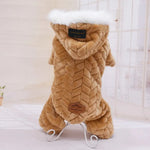 Plush pet hoodie jumpsuit with a braided texture design, white faux fur trim on the hood, and decorative labels on the back.