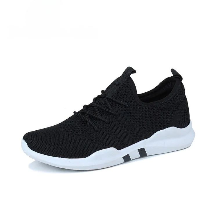 Black knit lace-up sneaker with a breathable mesh upper and a thick white sole with small black accents, shown on a white background.